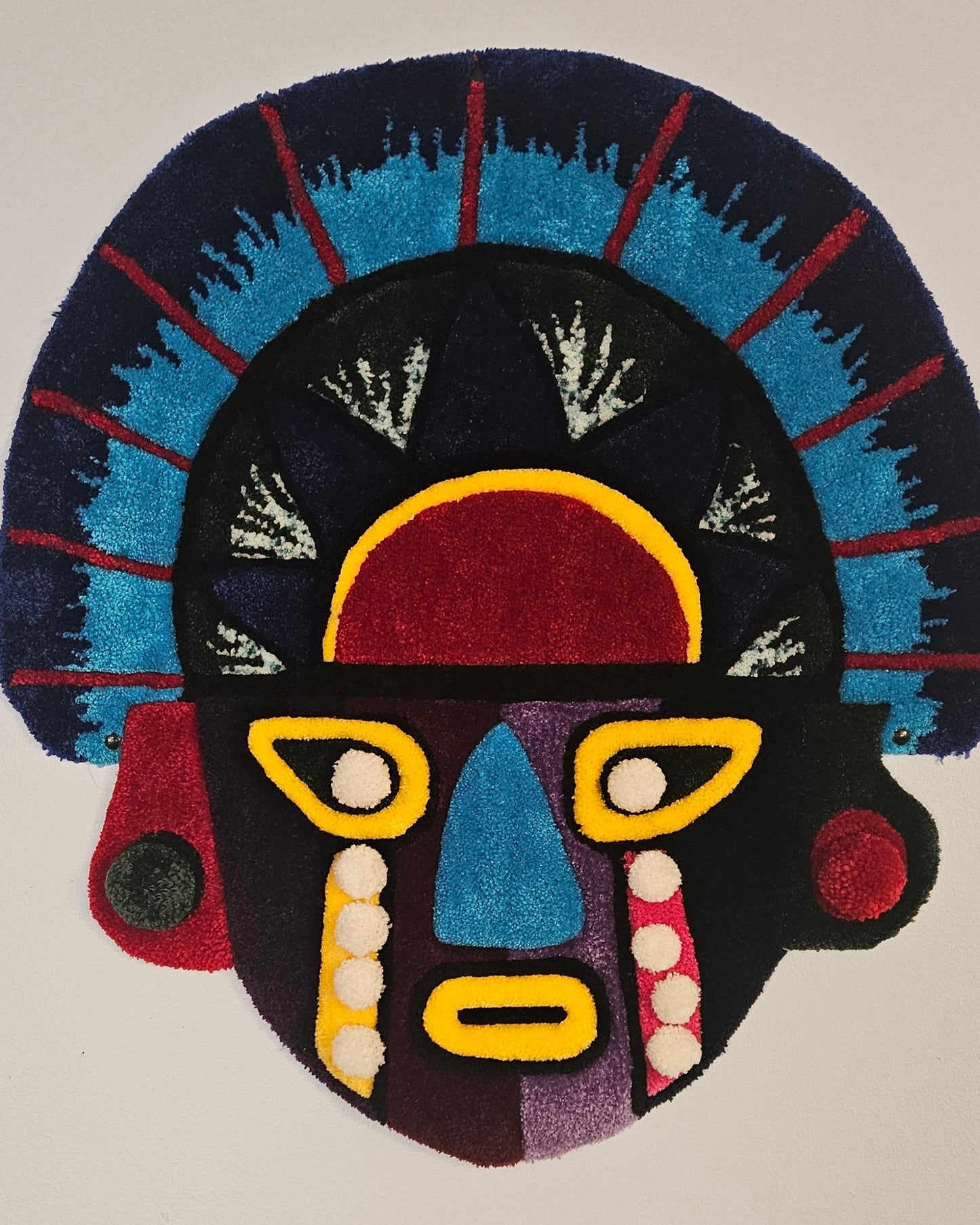 Vibrant Tribal Mask: Hand-Tufted Fiber Art Rug