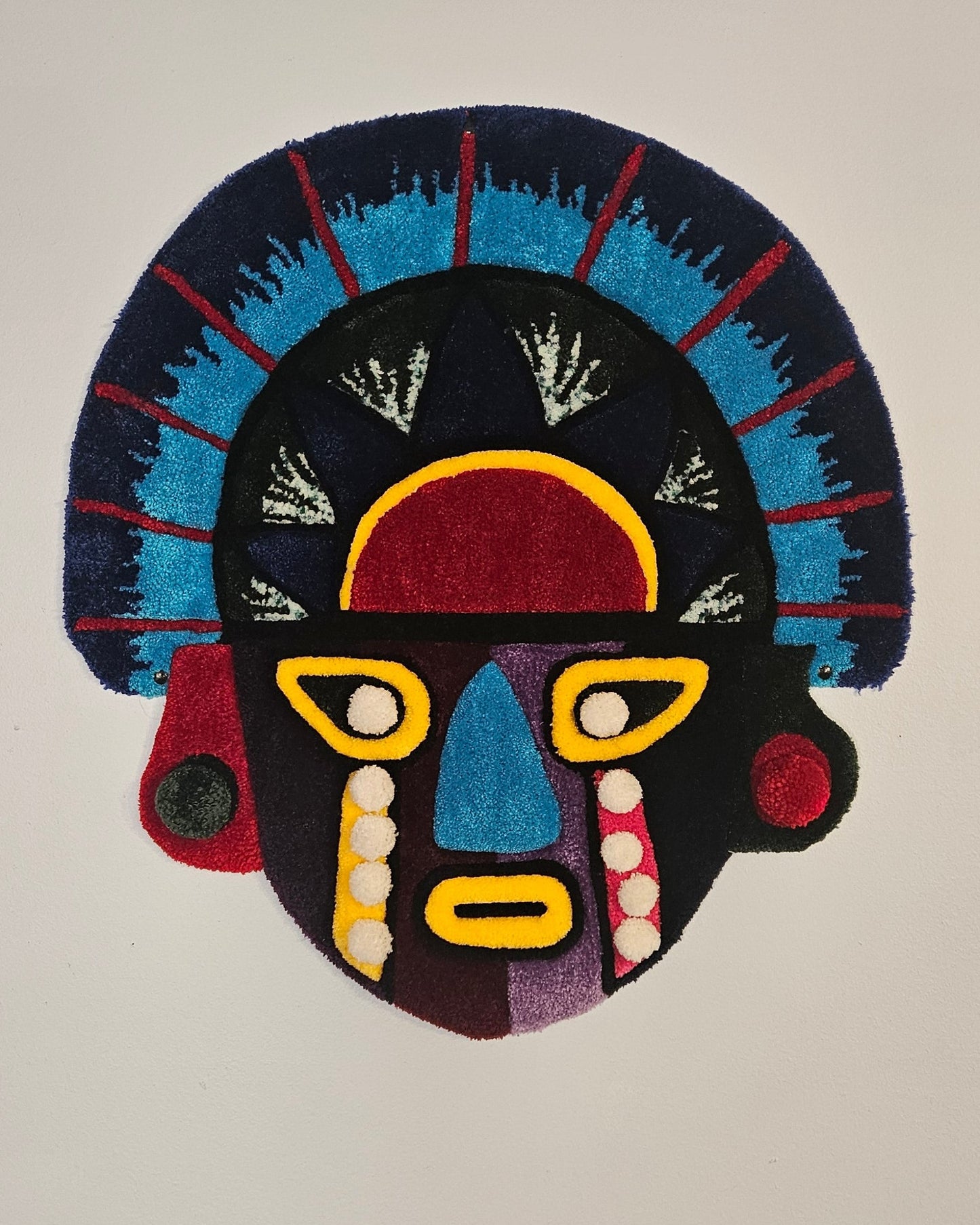 Vibrant Tribal Mask: Hand-Tufted Fiber Art Rug