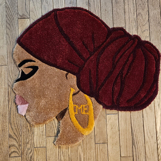 Ruby: Afrocentric Hand-Tufted Rug with Burgundy Headwrap and Gold Earring