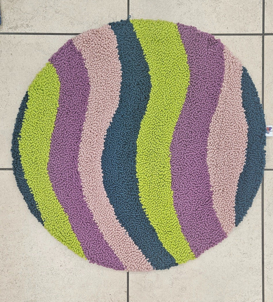 80s Yes round loop-pile functional fiber art in lime, purple, pink, and blue