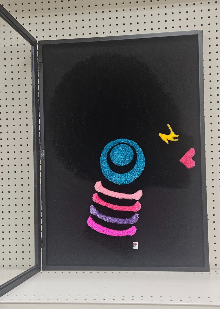 Crowned Silence black profile hand-tufted functional fiber art with colorful accents