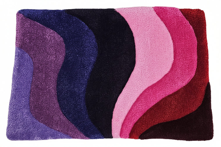 Fairy Rainbow hand-tufted functional fiber art with purple, pink, red, and burgundy rays