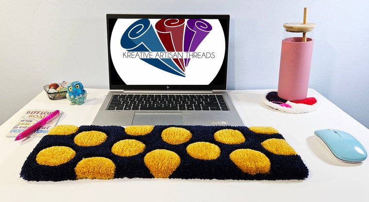 Golden Dots hand-tufted fiber desk art with gold dots on a navy background