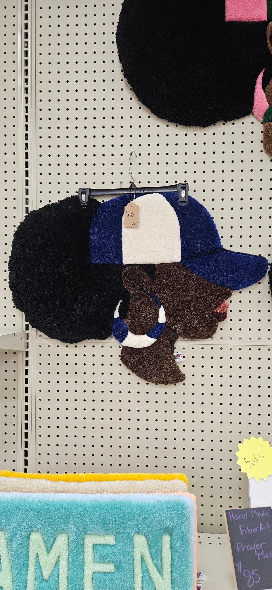 Blue and white Hey Gurl hand-tufted Afrocentric fiber art portrait with long-pile puff hair