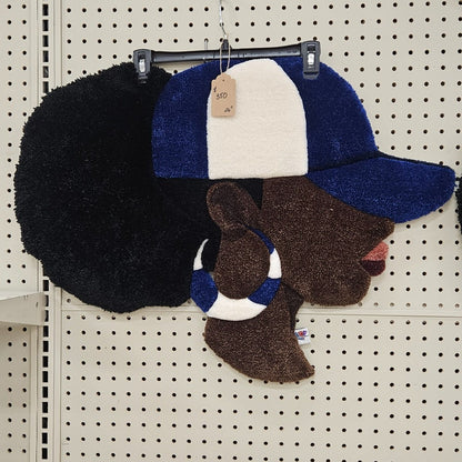 Blue and white Hey Gurl hand-tufted Afrocentric fiber art portrait with long-pile puff hair