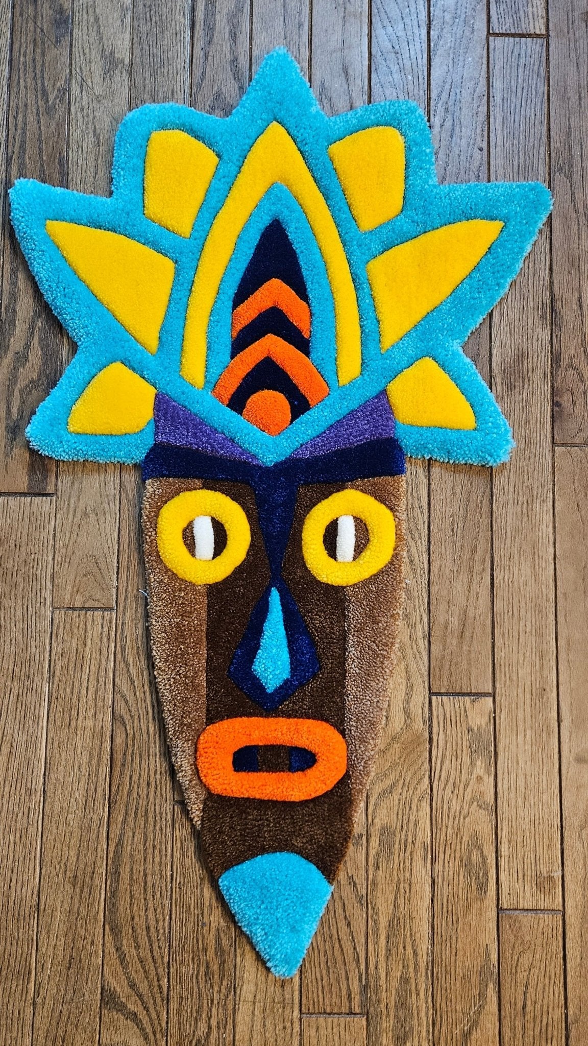 Radiant Tribal Mask: Hand - Tufted Rug Masterpiece - Kreative Artisan Threads