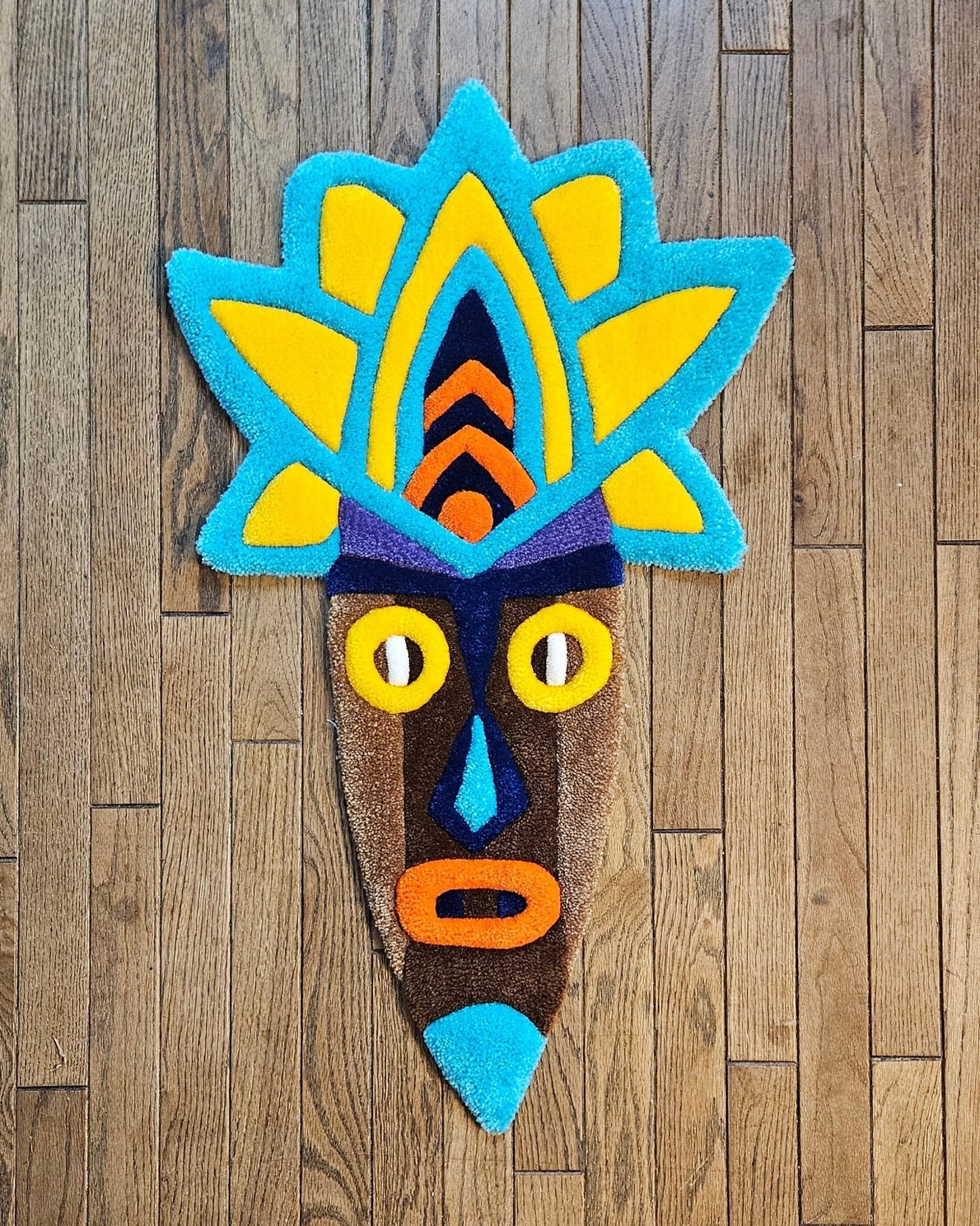 Radiant Tribal Mask: Hand - Tufted Rug Masterpiece - Kreative Artisan Threads