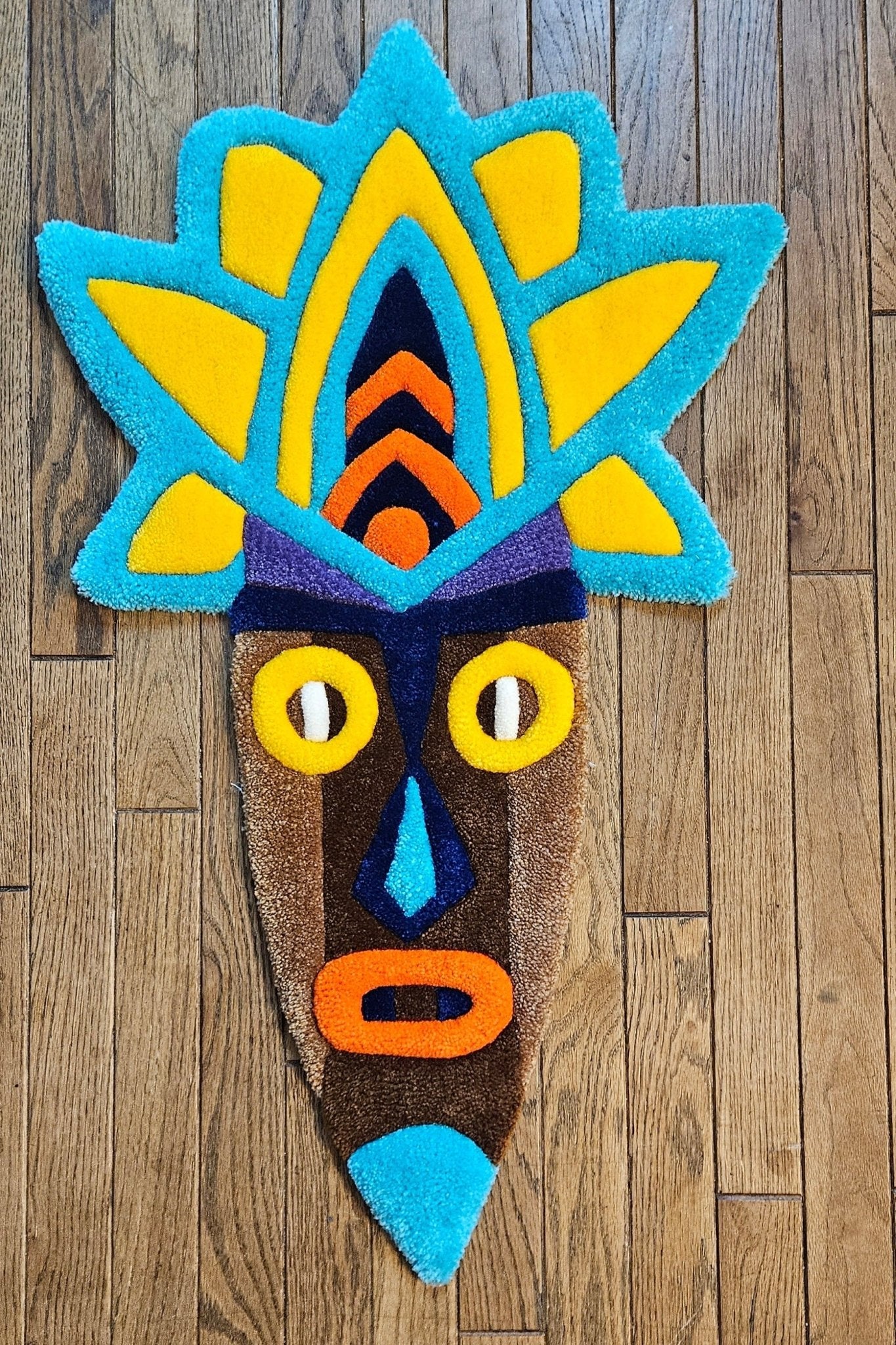 Radiant Tribal Mask: Hand - Tufted Rug Masterpiece - Kreative Artisan Threads