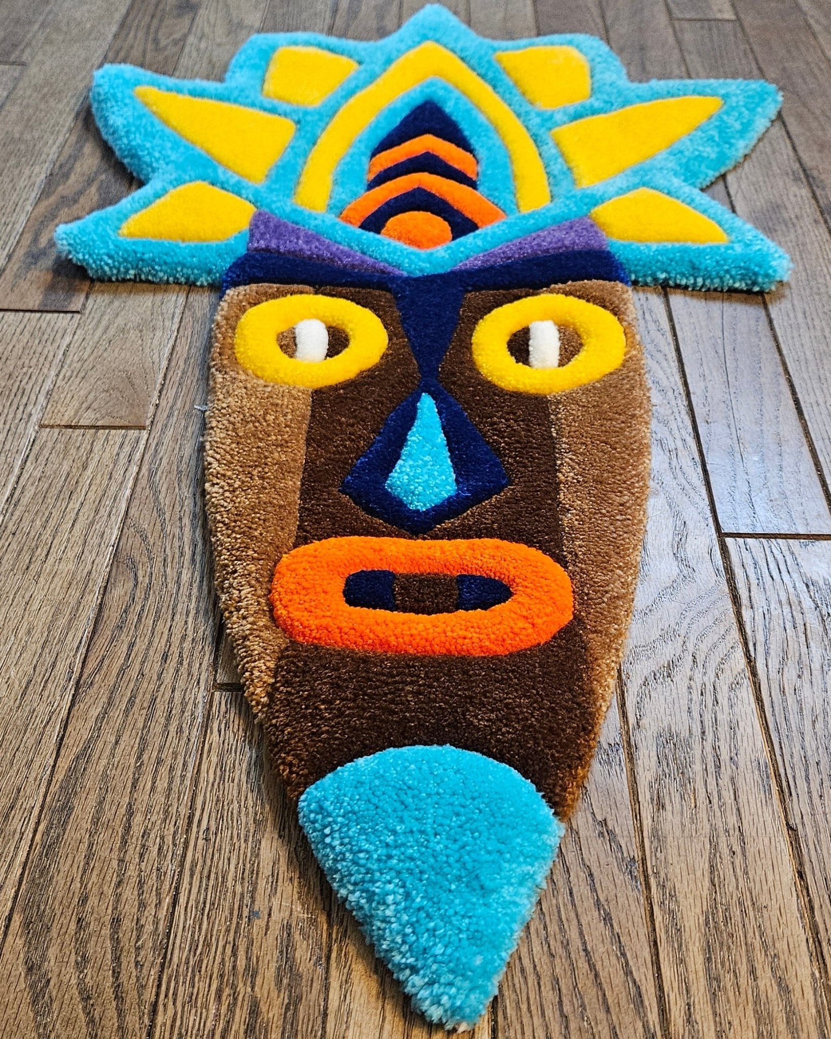 Radiant Tribal Mask: Hand - Tufted Rug Masterpiece - Kreative Artisan Threads