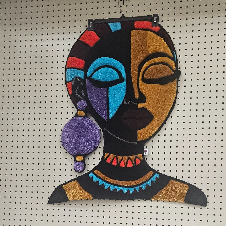 The Goddess hand-tufted functional fiber art displayed at Pop-Up & Grow