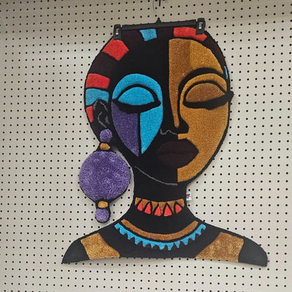 The Goddess hand-tufted functional fiber art displayed at Pop-Up & Grow